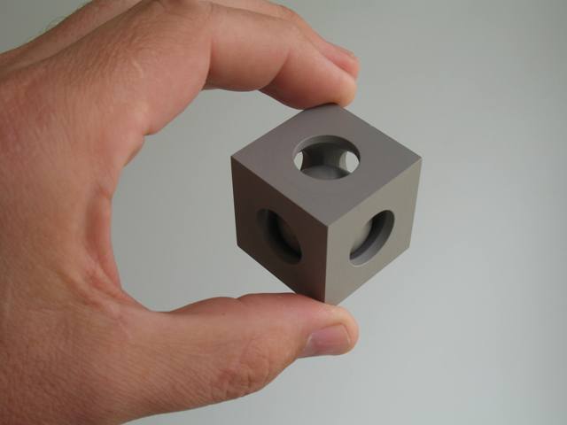 BnC53 anodised cube on holder small.jpg